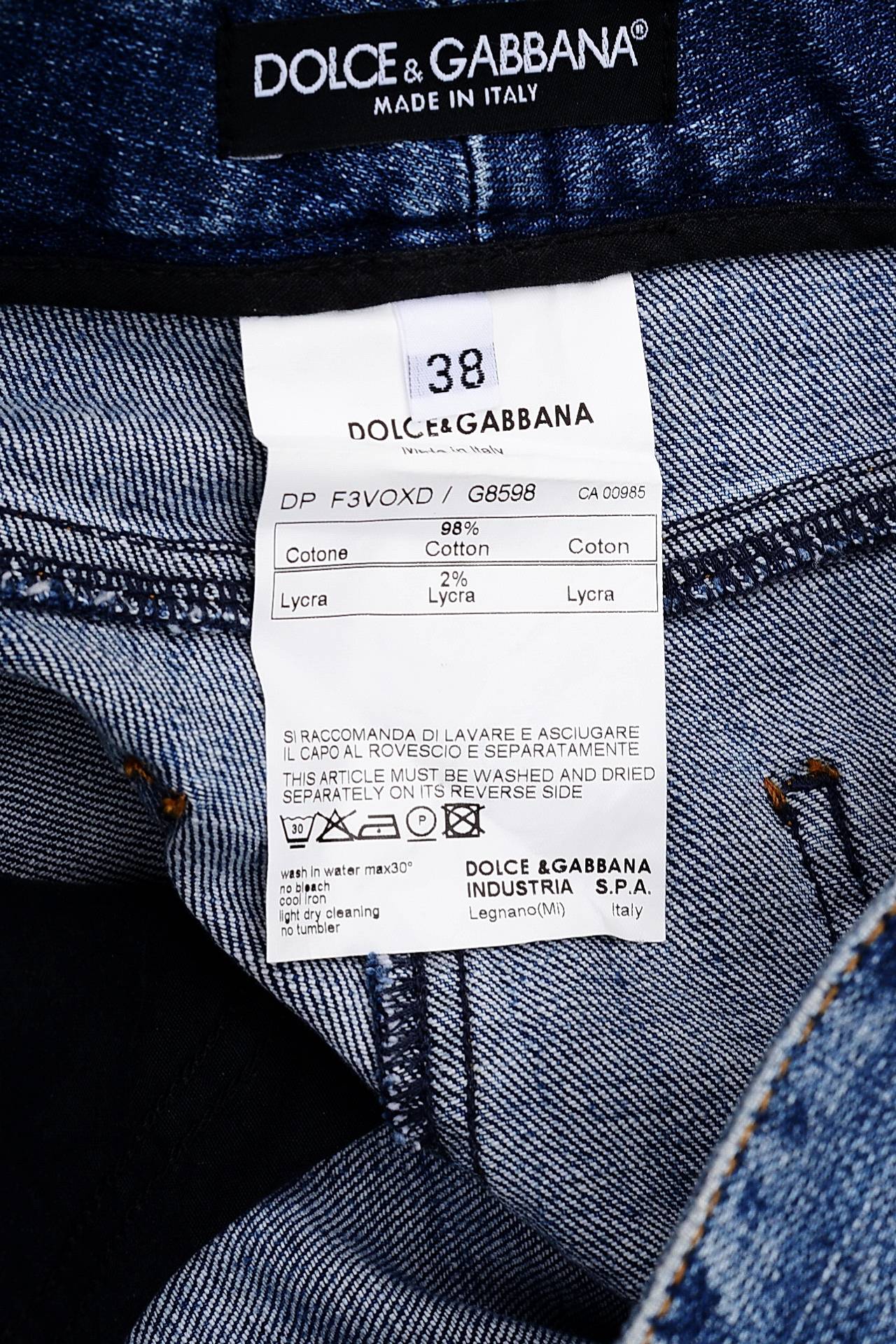 Как отличить оригинал дольче габбана. Бирка Дольче Габбана оригинал. Этикетки Дольче Габбана оригинал. Dolce Gabbana джинсы бирки. Dolce Gabbana made in Italy джинсы g3qgtd g8469.